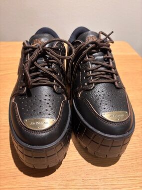 Jordan Women’s Black Sneakers with Bronze Accents